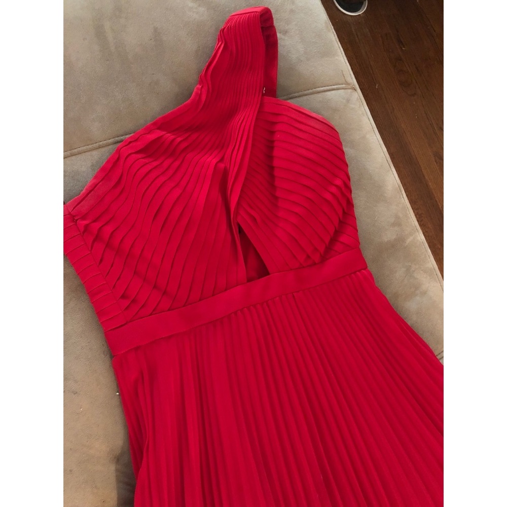 One shoulder strap long red dress.